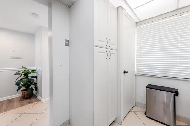 a view of a hallway and closet