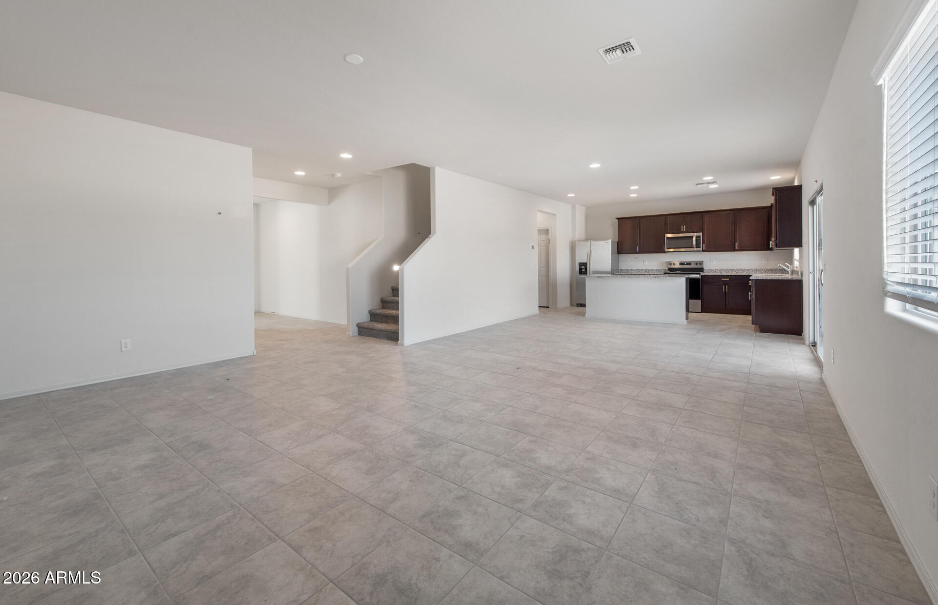43010 West Palo Amarillo Road Maricopa, AZ 85138 - Photo 8 of 22 7 - Gathering Room and Kitchen