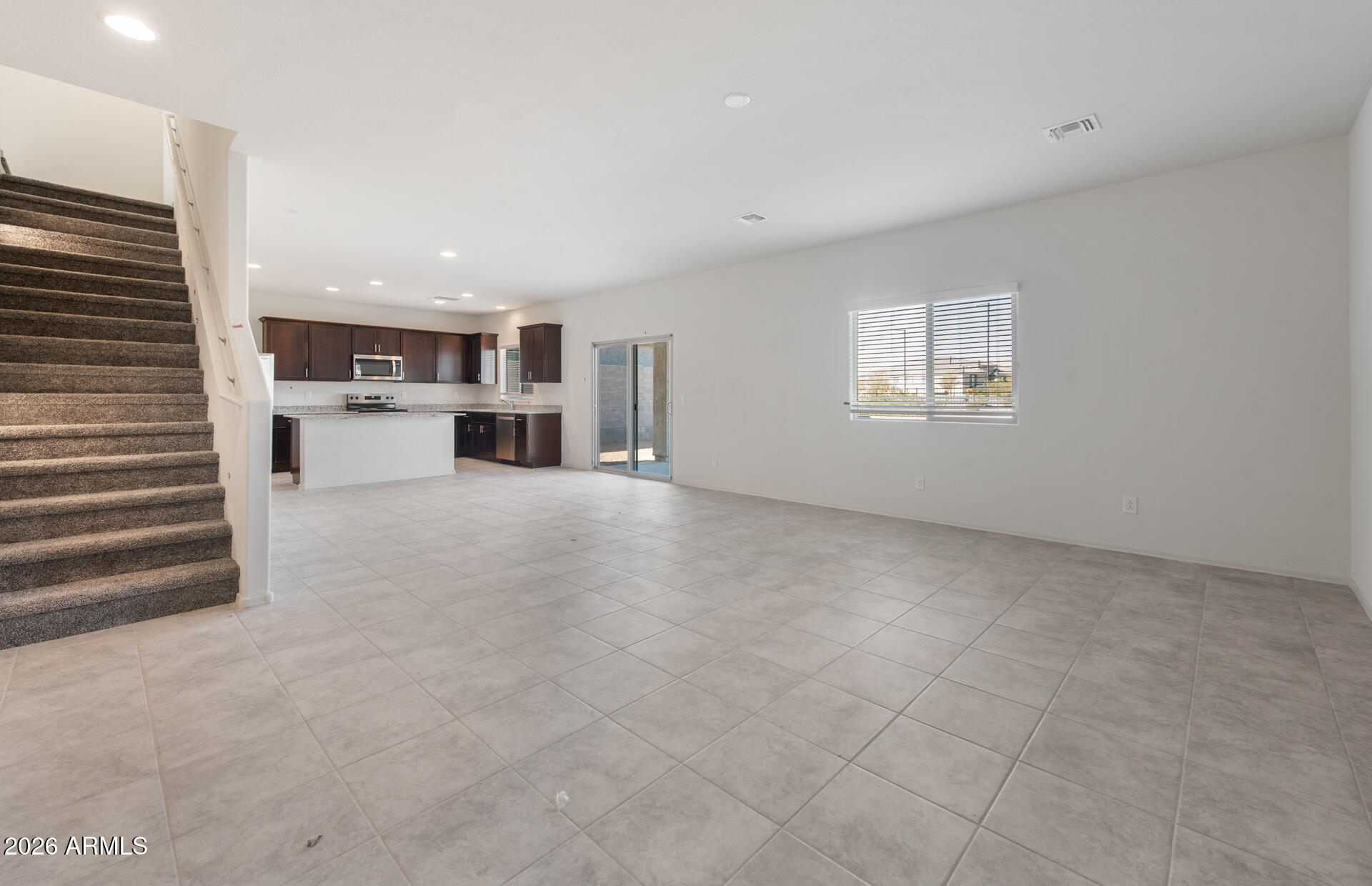 43010 West Palo Amarillo Road Maricopa, AZ 85138 - Photo 9 of 22 8 - Gathering Room and Kitchen