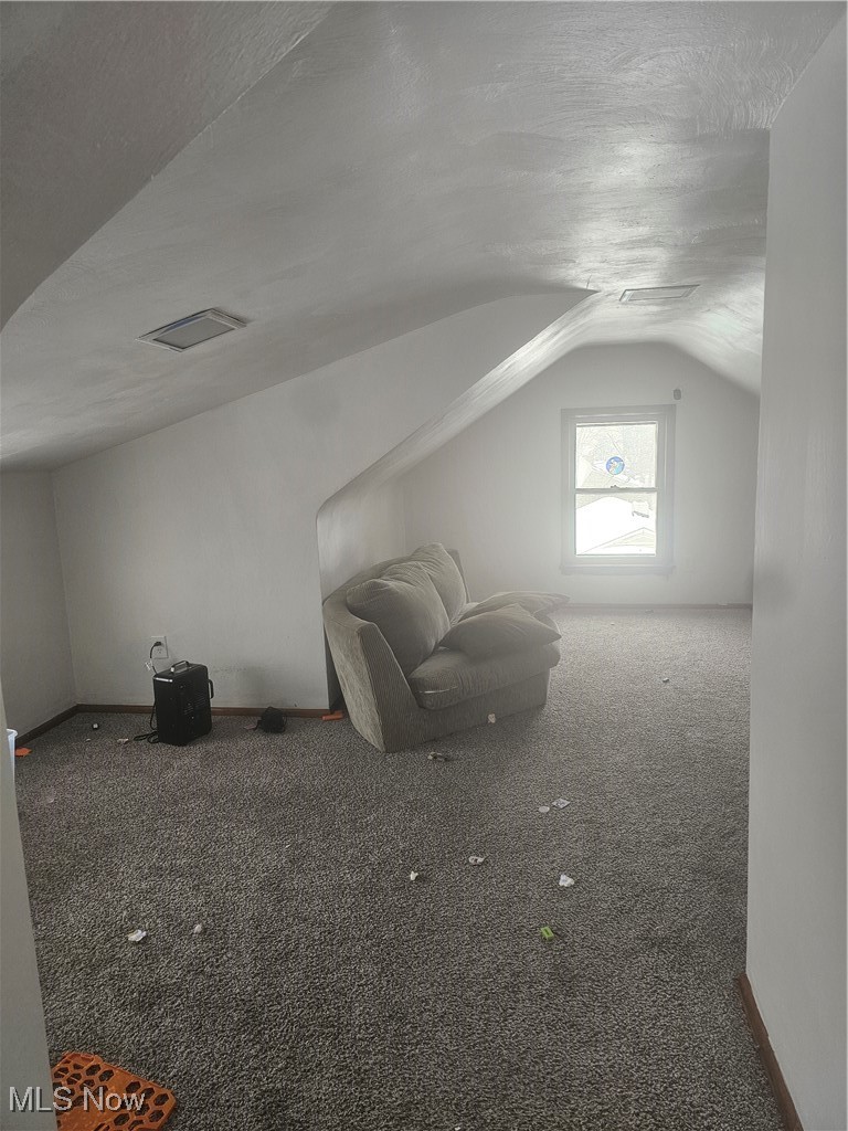 25150 Columbus Road Bedford Heights, OH 44146 - Photo 23 of 30 Additional living space featuring carpet floors and baseboards