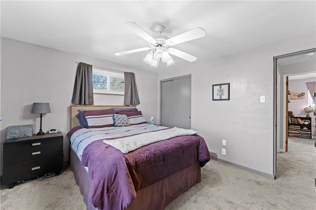 800 Burchfield Road Allison Park, PA 15101 - Photo 12 of 30 a bedroom with a bed and a chandelier