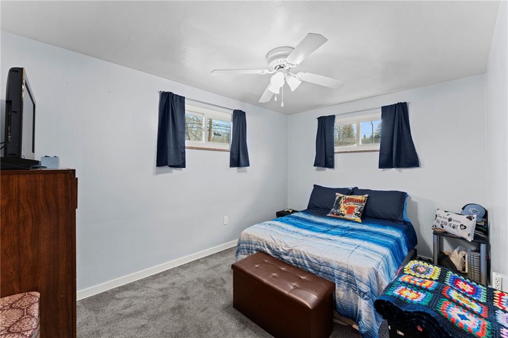 800 Burchfield Road Allison Park, PA 15101 - Photo 14 of 30 a bedroom with a bed and a chandelier