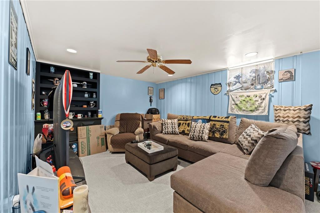 800 Burchfield Road Allison Park, PA 15101 - Photo 20 of 30 a living room with furniture ceiling fan and a rug