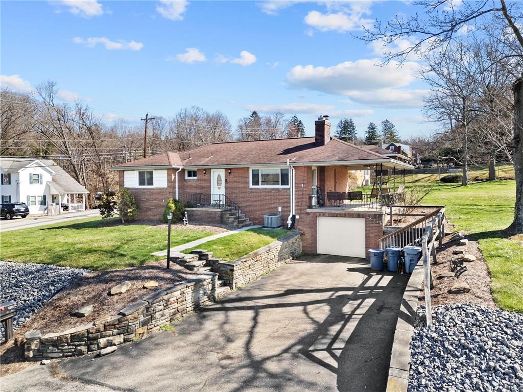 800 Burchfield Road Allison Park, PA 15101 - Photo 2 of 30 a view of a house with backyard porch and garden