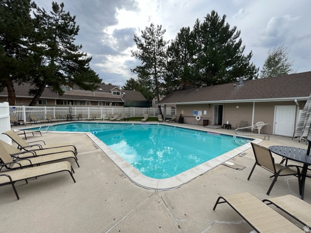 6884 670 East Midvale, UT 84047 - Photo 24 of 28 Community pool with a patio area