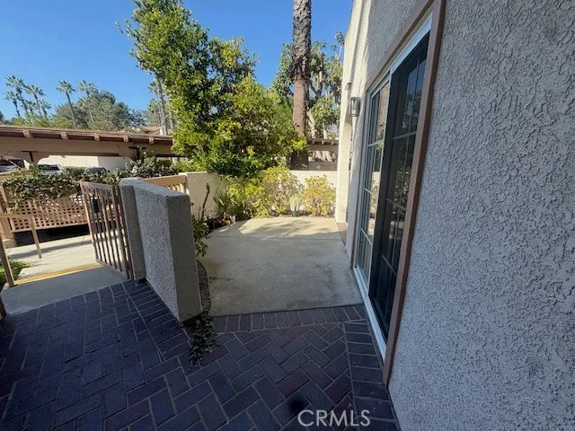 a view of balcony with furniture