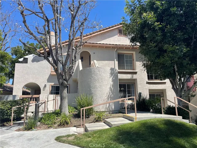 a backyard of a house with seating space