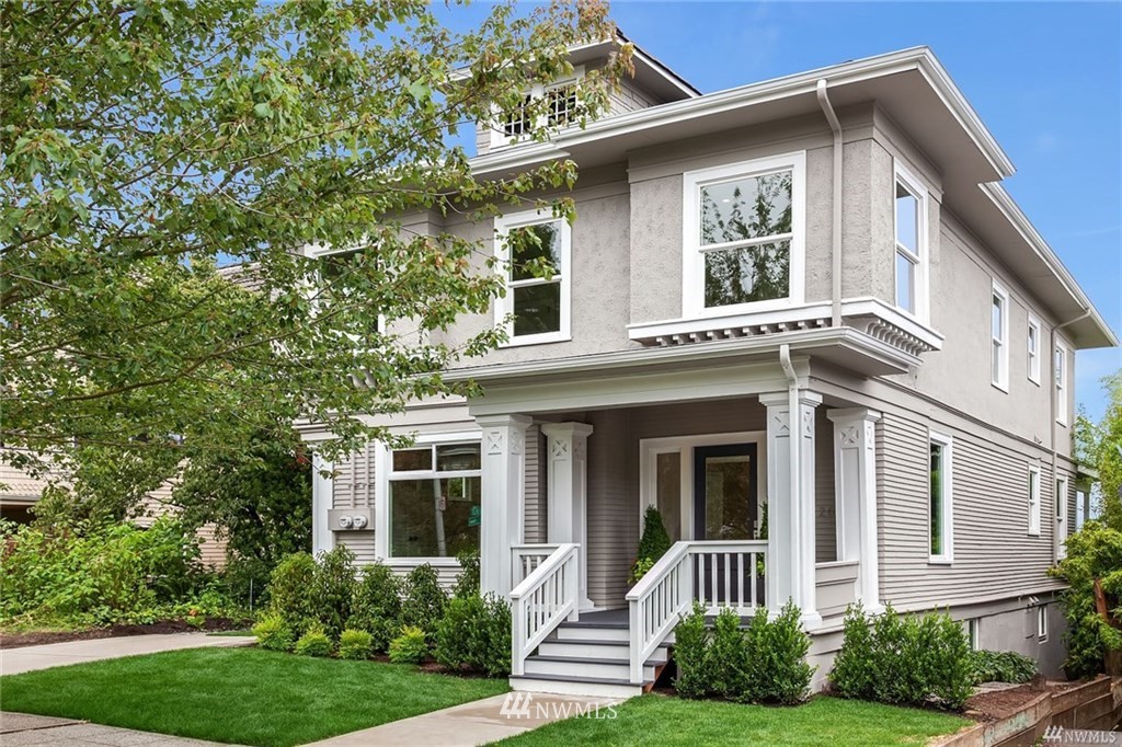 206 30th Avenue Seattle, WA 98122 - Photo 2 of 21 front view of a house with a yard