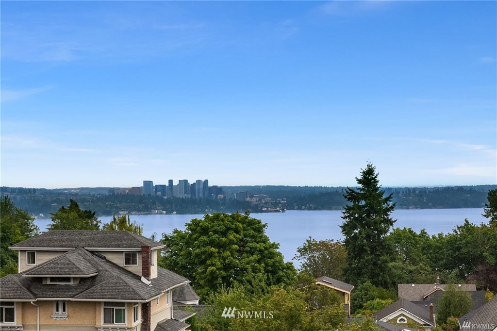 206 30th Avenue Seattle, WA 98122 - Photo 11 of 21 a view of a lake and a city