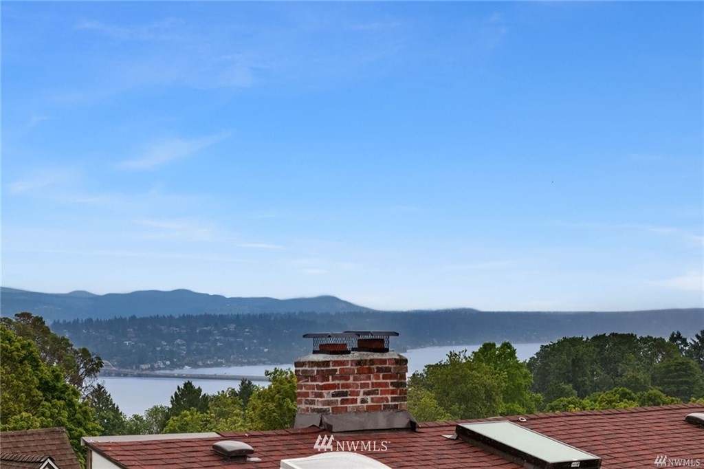 206 30th Avenue Seattle, WA 98122 - Photo 12 of 21 an aerial view of a house with a mountain view