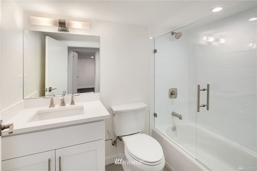 206 30th Avenue Seattle, WA 98122 - Photo 18 of 21 a bathroom with a sink a toilet and shower