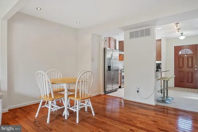 a view of a livingroom with furniture and wooden floor
