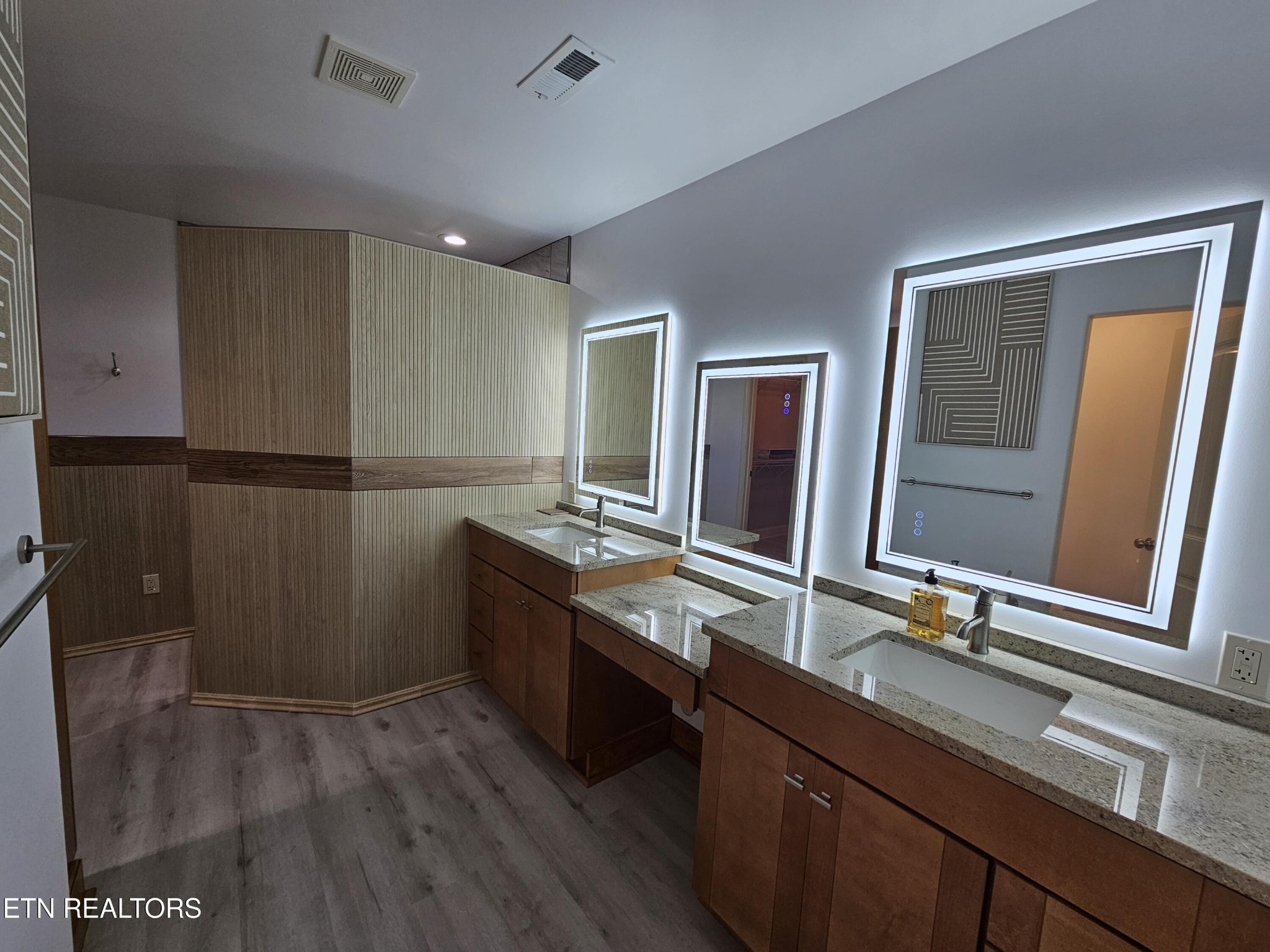 5920 Whisper Ridge Lane Corryton, TN 37721 - Photo 18 of 49 a bathroom with a sink and mirror