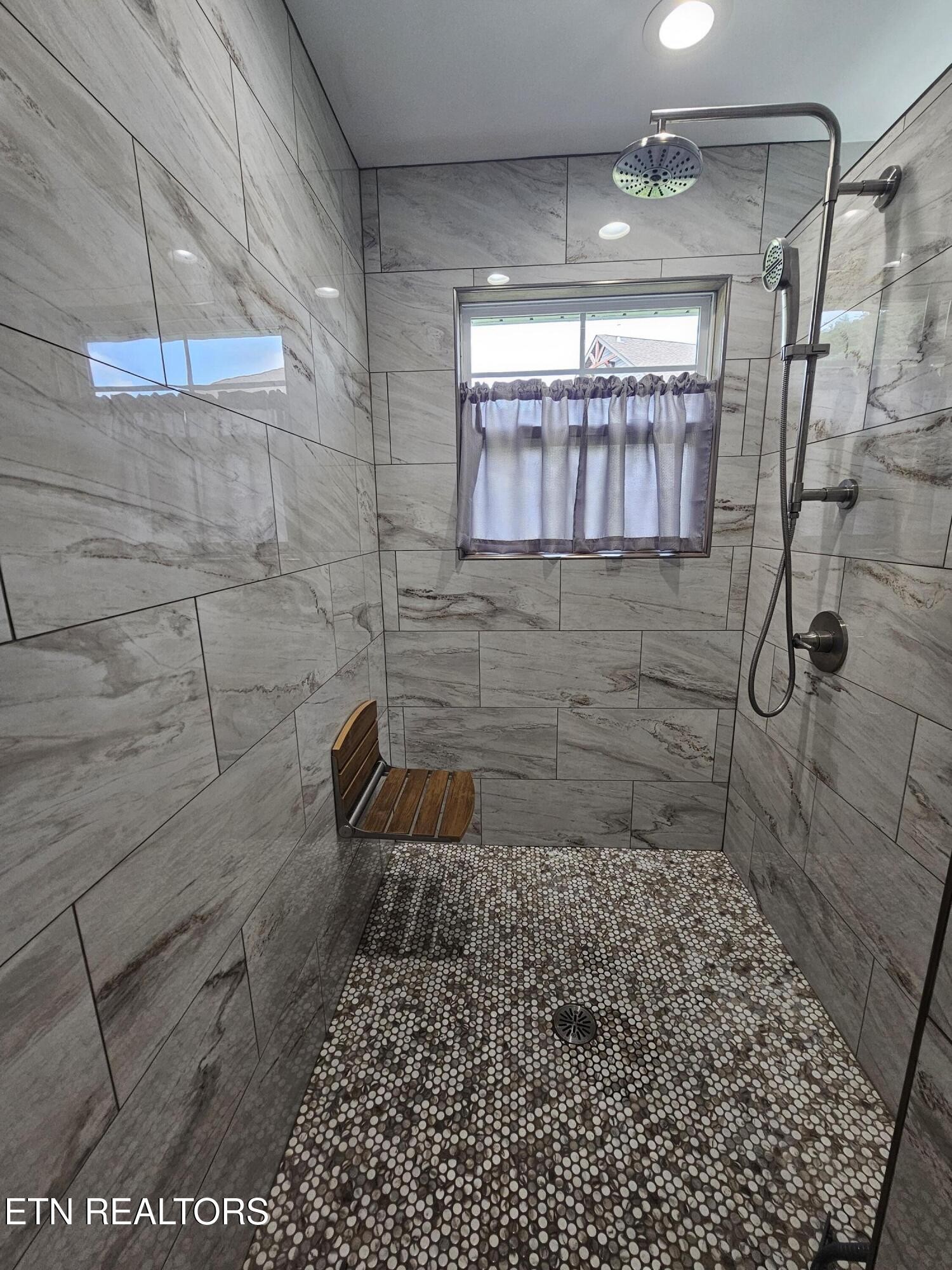 5920 Whisper Ridge Lane Corryton, TN 37721 - Photo 19 of 49 a bathroom with a shower