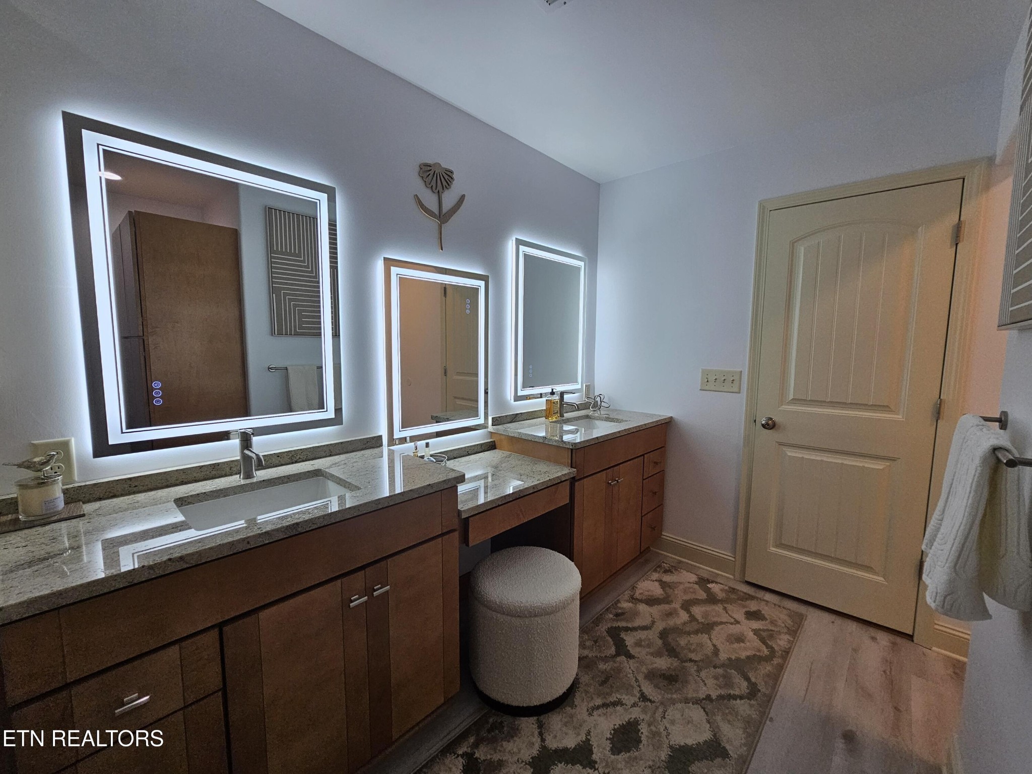 5920 Whisper Ridge Lane Corryton, TN 37721 - Photo 21 of 49 a bathroom with a granite countertop toilet sink and mirror