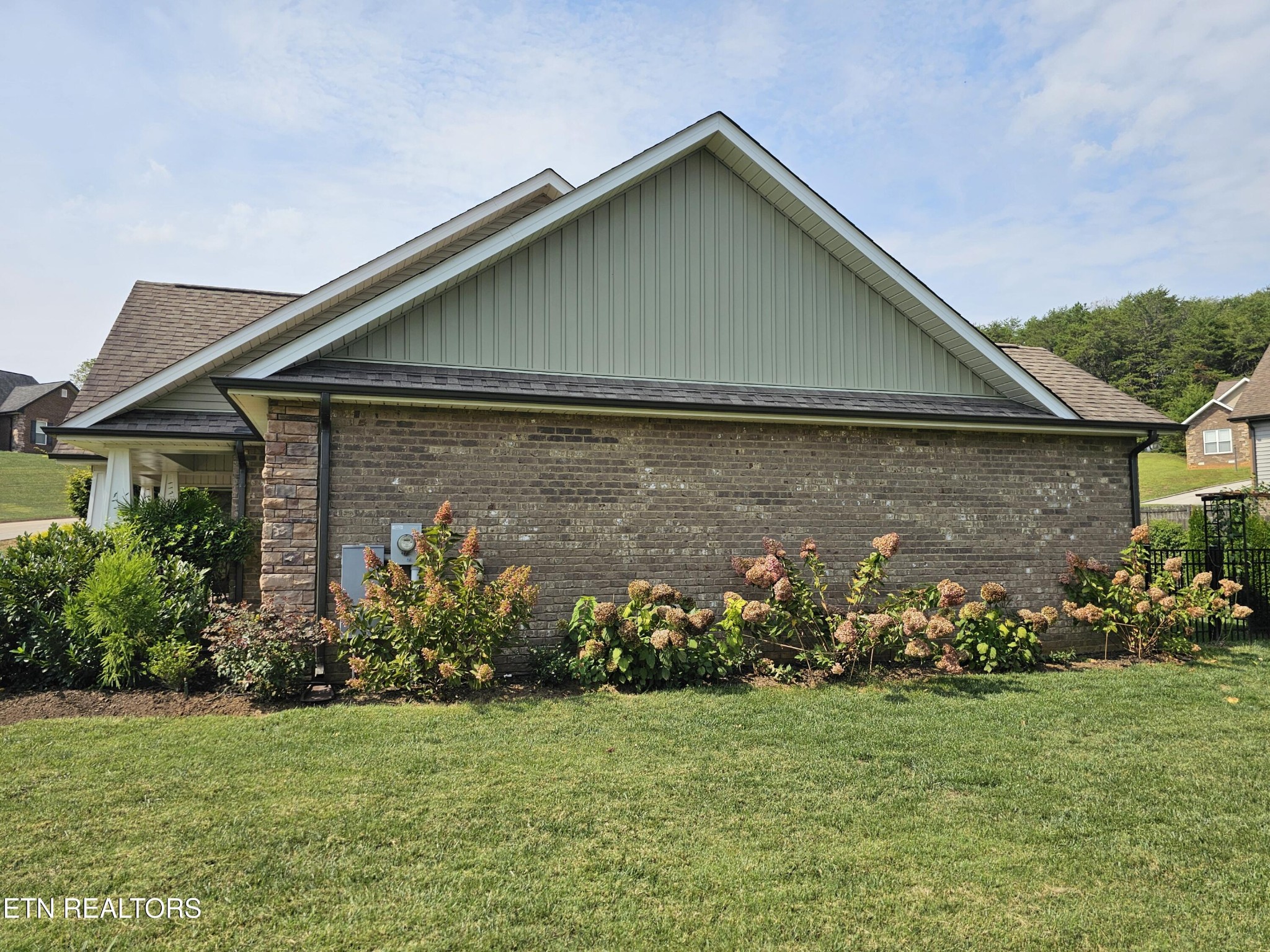 5920 Whisper Ridge Lane Corryton, TN 37721 - Photo 34 of 49 a front view of house with garden