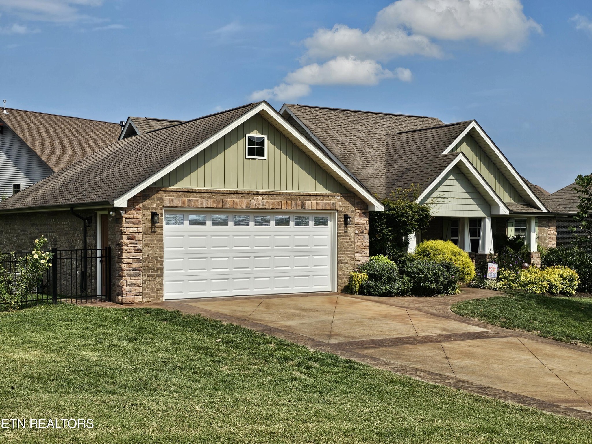 5920 Whisper Ridge Lane Corryton, TN 37721 - Photo 38 of 49 a front view of a house with a yard