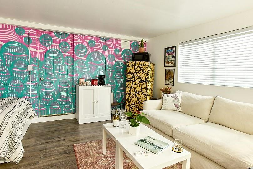420 Northwest 111th Street Miami, FL 33168 - Photo 7 of 12 a living room with furniture and a window