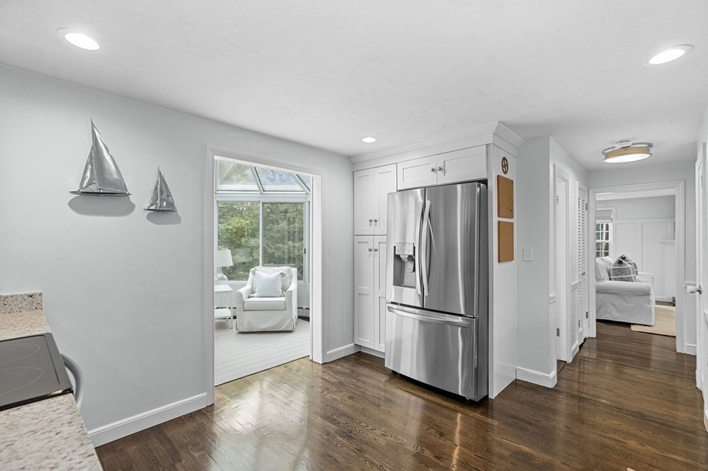 37 Old Forge Road Scituate, MA 02066 - Photo 14 of 42 a kitchen with stainless steel appliances a refrigerator and wooden floor