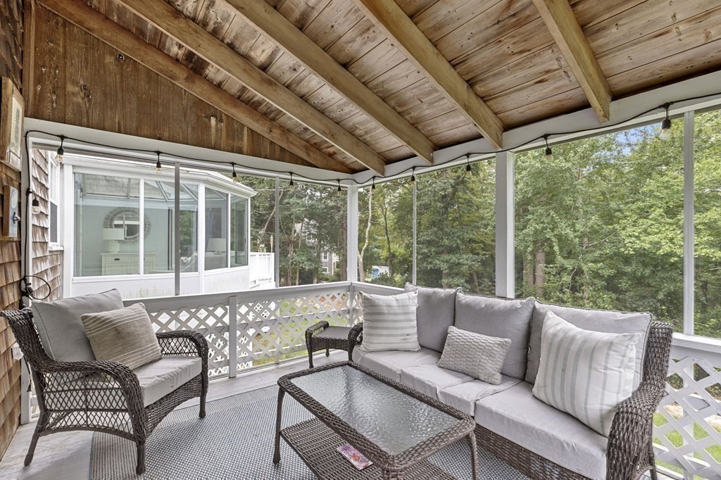 37 Old Forge Road Scituate, MA 02066 - Photo 25 of 42 a balcony with furniture and a large window