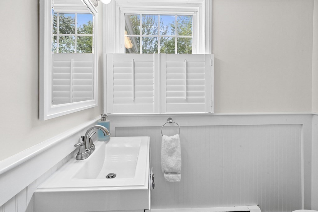 37 Old Forge Road Scituate, MA 02066 - Photo 27 of 42 a bathroom with a sink and a window