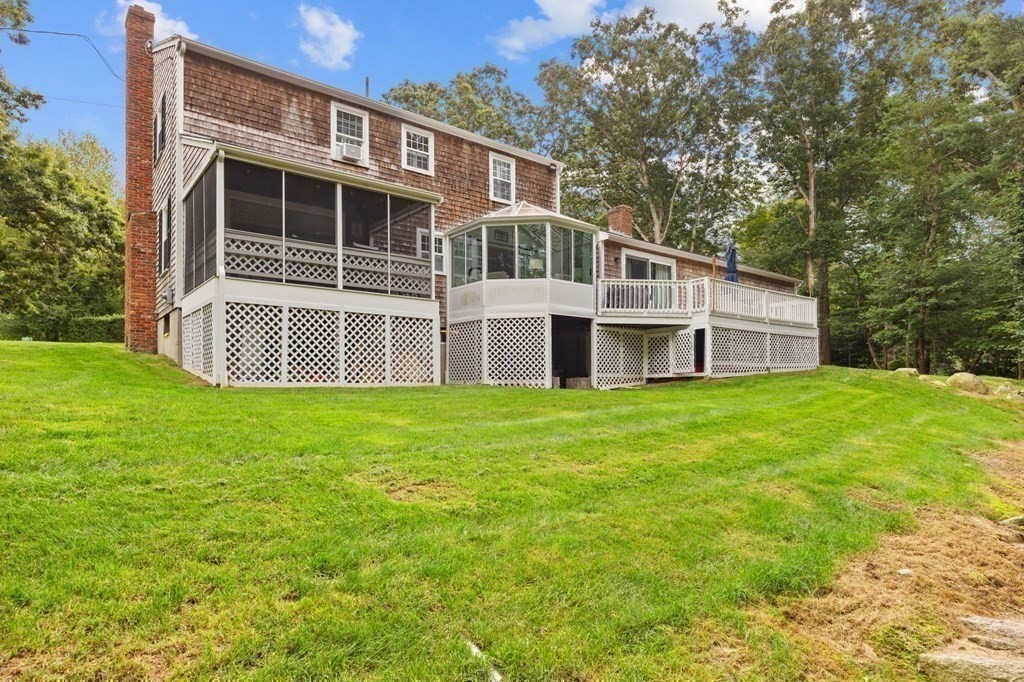 37 Old Forge Road Scituate, MA 02066 - Photo 36 of 42 a front view of a house with a yard