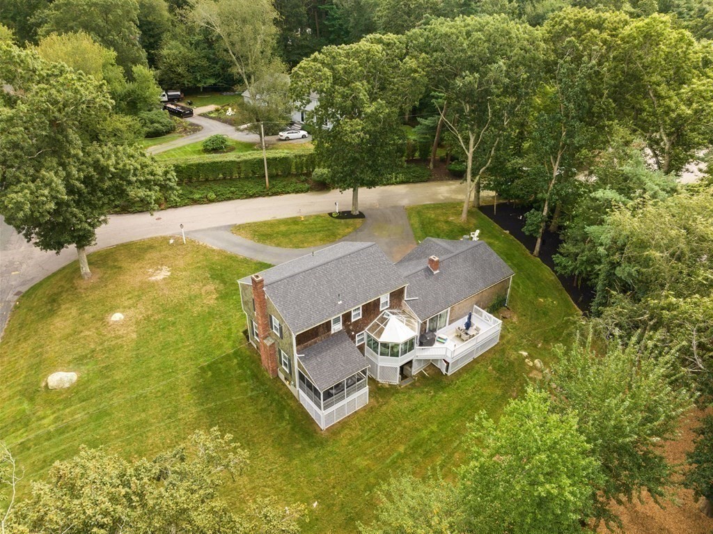 37 Old Forge Road Scituate, MA 02066 - Photo 40 of 42 a view of yard with swimming pool and trees in the background