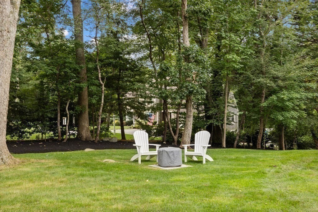 37 Old Forge Road Scituate, MA 02066 - Photo 4 of 42 a view of a bench in a garden