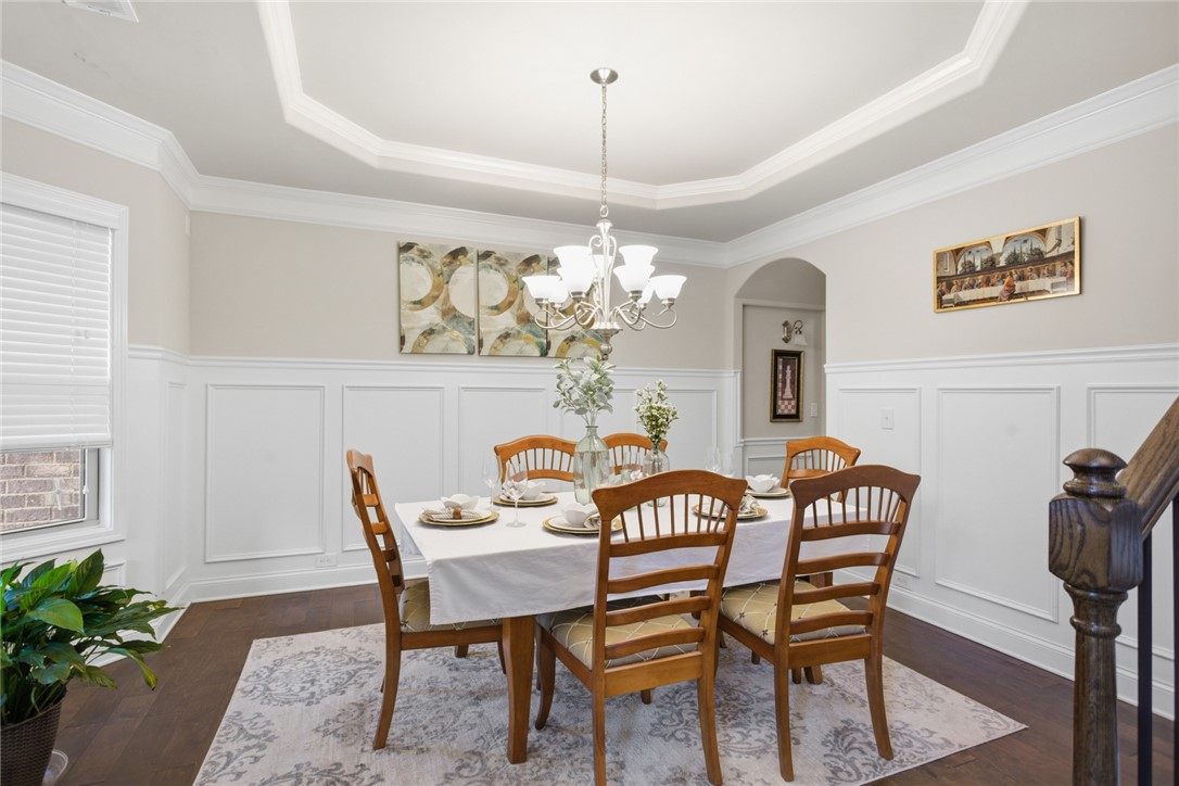 120 Jones Creek Circle Anderson, SC 29621 - Photo 11 of 43 This elegant dining room features hardwood floors and a striking tray ceiling.