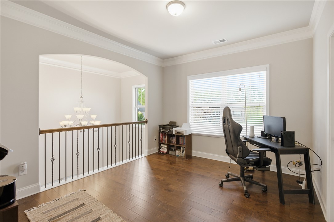 120 Jones Creek Circle Anderson, SC 29621 - Photo 14 of 43 Bright and open, this versatile space features rich hardwood floors and elegant architectural details.
