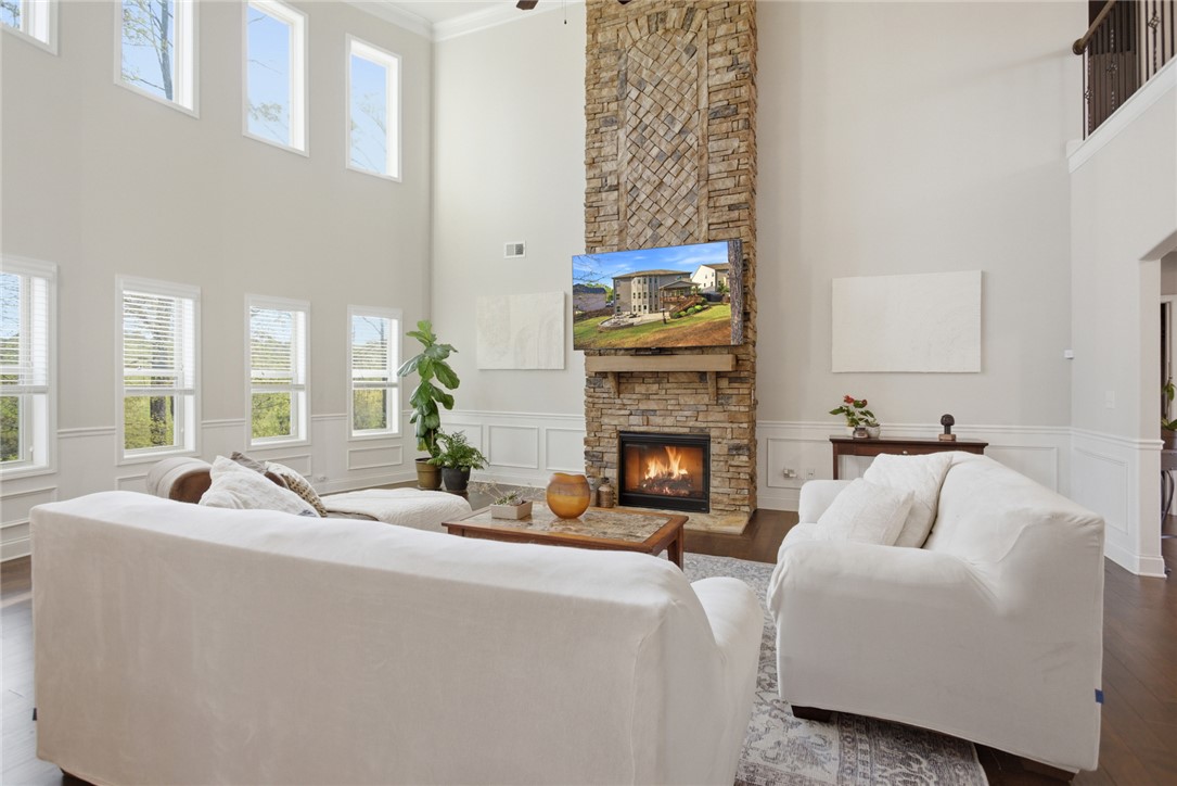 120 Jones Creek Circle Anderson, SC 29621 - Photo 2 of 43 This living room features high ceilings and a grand stone fireplace.