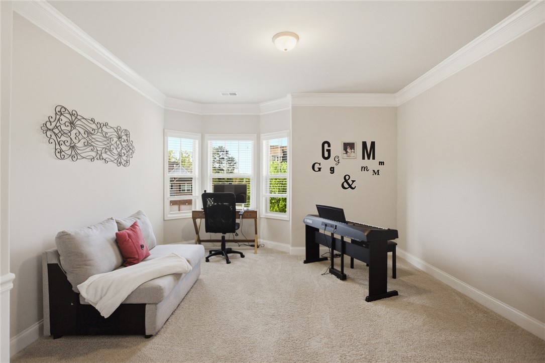 120 Jones Creek Circle Anderson, SC 29621 - Photo 21 of 43 This versatile room features abundant natural light and ample space for various activities.