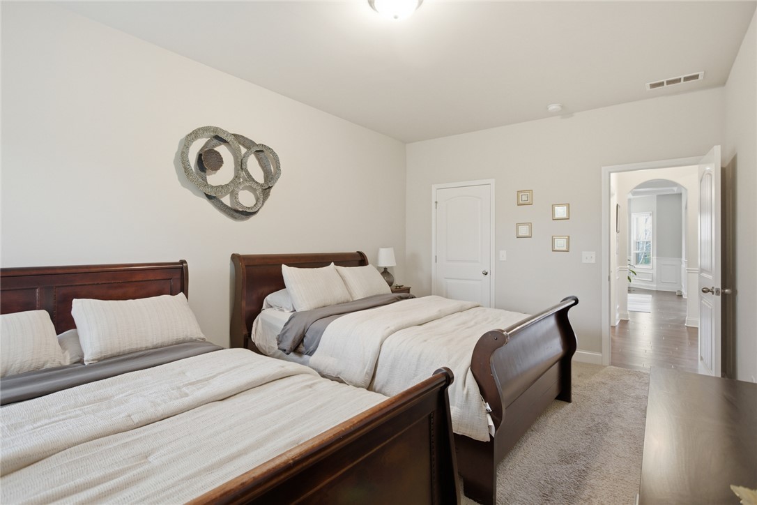 120 Jones Creek Circle Anderson, SC 29621 - Photo 23 of 43 This cozy bedroom offers a tranquil retreat with soft lighting and comfortable carpeting.