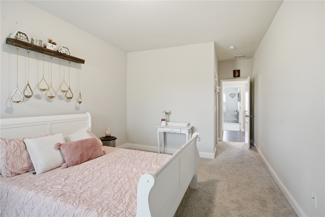 120 Jones Creek Circle Anderson, SC 29621 - Photo 26 of 43 This cozy bedroom offers a tranquil retreat with soft lighting and comfortable flooring.