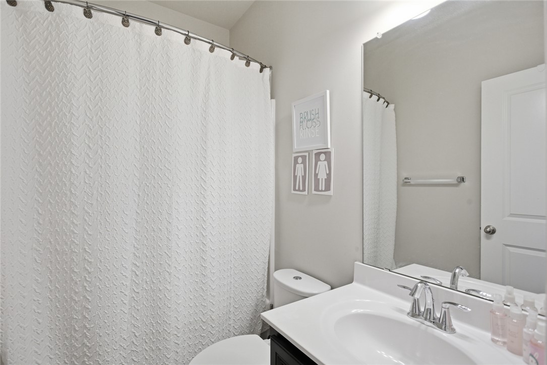 120 Jones Creek Circle Anderson, SC 29621 - Photo 29 of 43 This bathroom features a sleek vanity and convenient toilet, offering comfort and style.