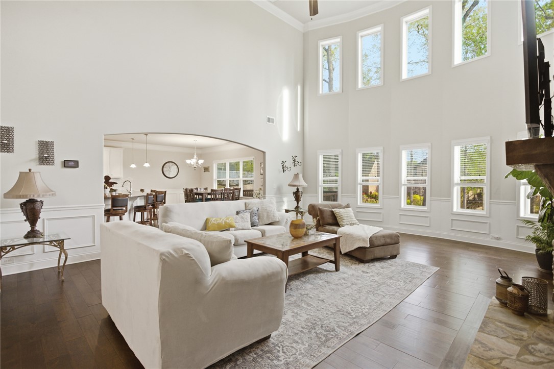 120 Jones Creek Circle Anderson, SC 29621 - Photo 3 of 43 This living room features expansive high ceilings and beautiful hardwood flooring.