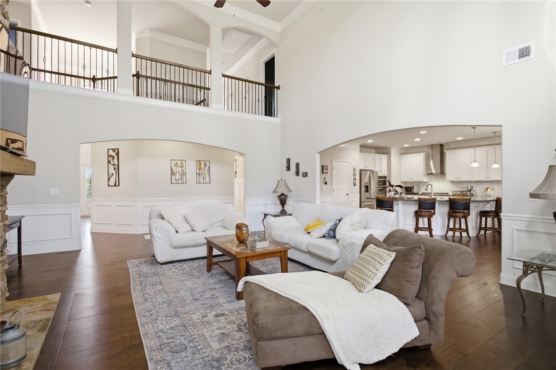 120 Jones Creek Circle Anderson, SC 29621 - Photo 4 of 43 This grand living area features high ceilings and an open-concept flow to the kitchen, perfect for entertaining.