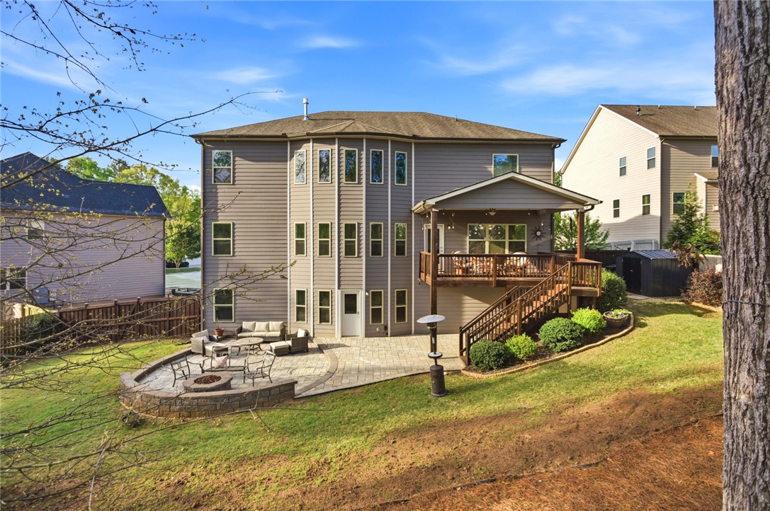 120 Jones Creek Circle Anderson, SC 29621 - Photo 43 of 43 This spacious property features a walk-out patio, a cozy fire pit, and a charming deck for outdoor living.