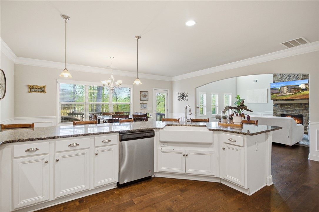 120 Jones Creek Circle Anderson, SC 29621 - Photo 6 of 43 This spacious kitchen, flowing into the living area, features a large island and ample cabinetry.