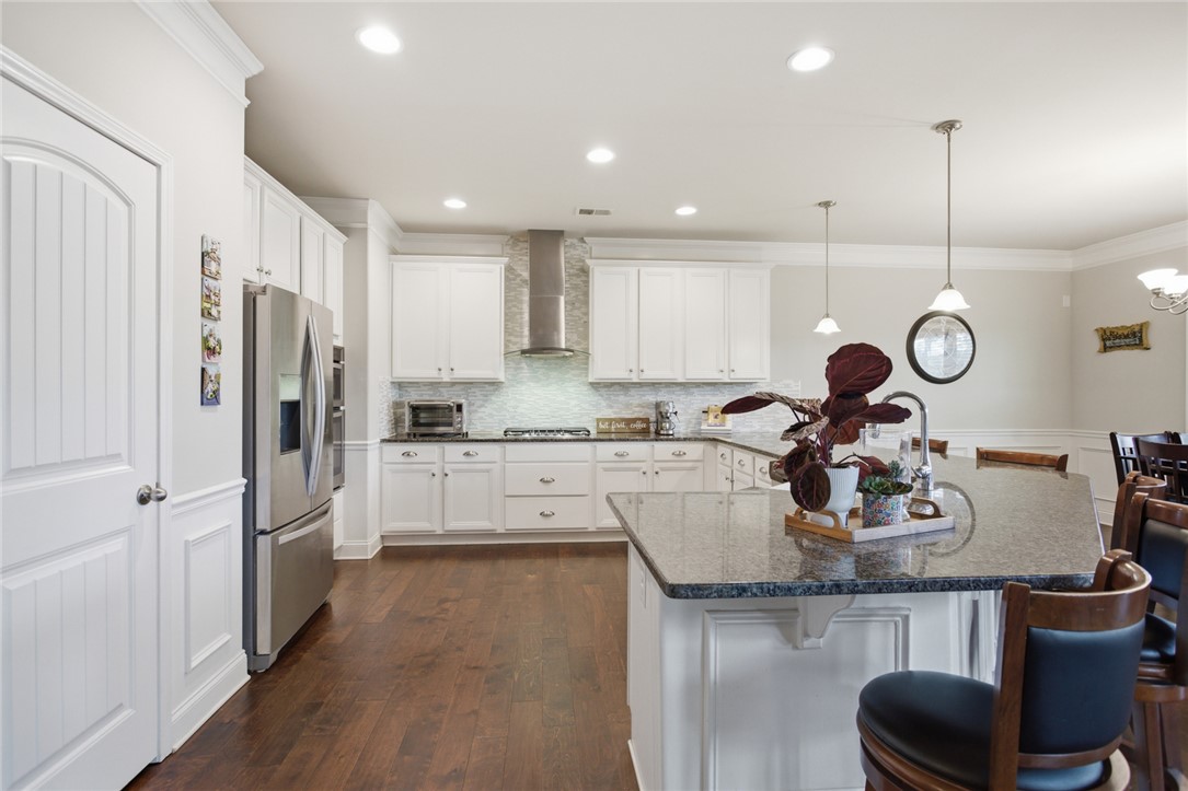 120 Jones Creek Circle Anderson, SC 29621 - Photo 8 of 43 This kitchen features a spacious island with ample seating, perfect for casual dining and entertaining.
