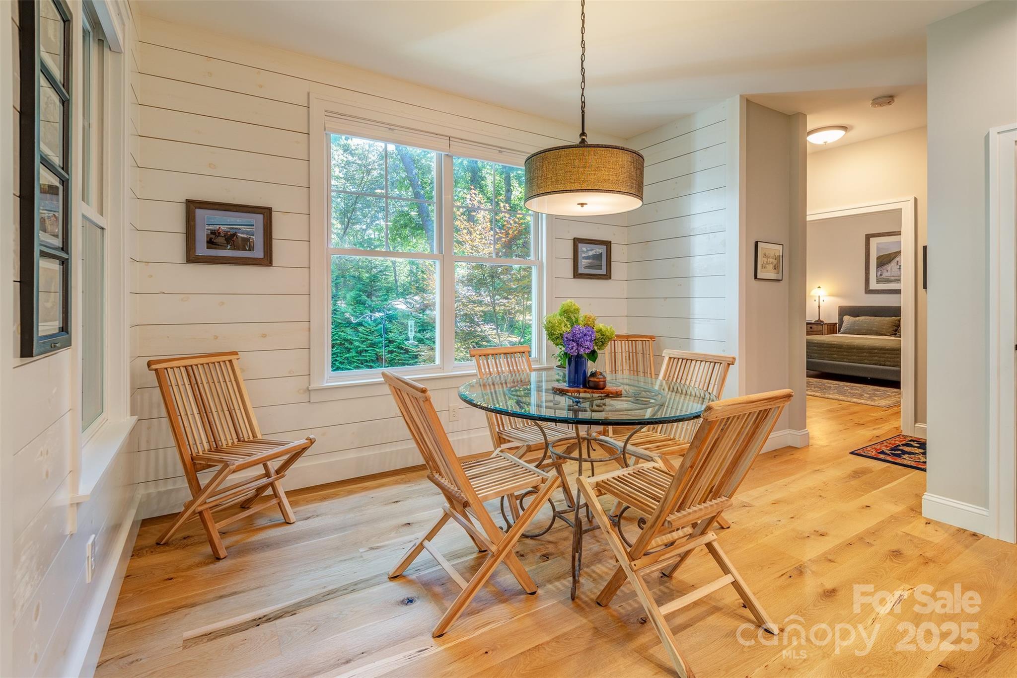 21 Ducketts Grove Road Fletcher, NC 28732 - Photo 15 of 42 a view of a dining room with furniture window and outside view