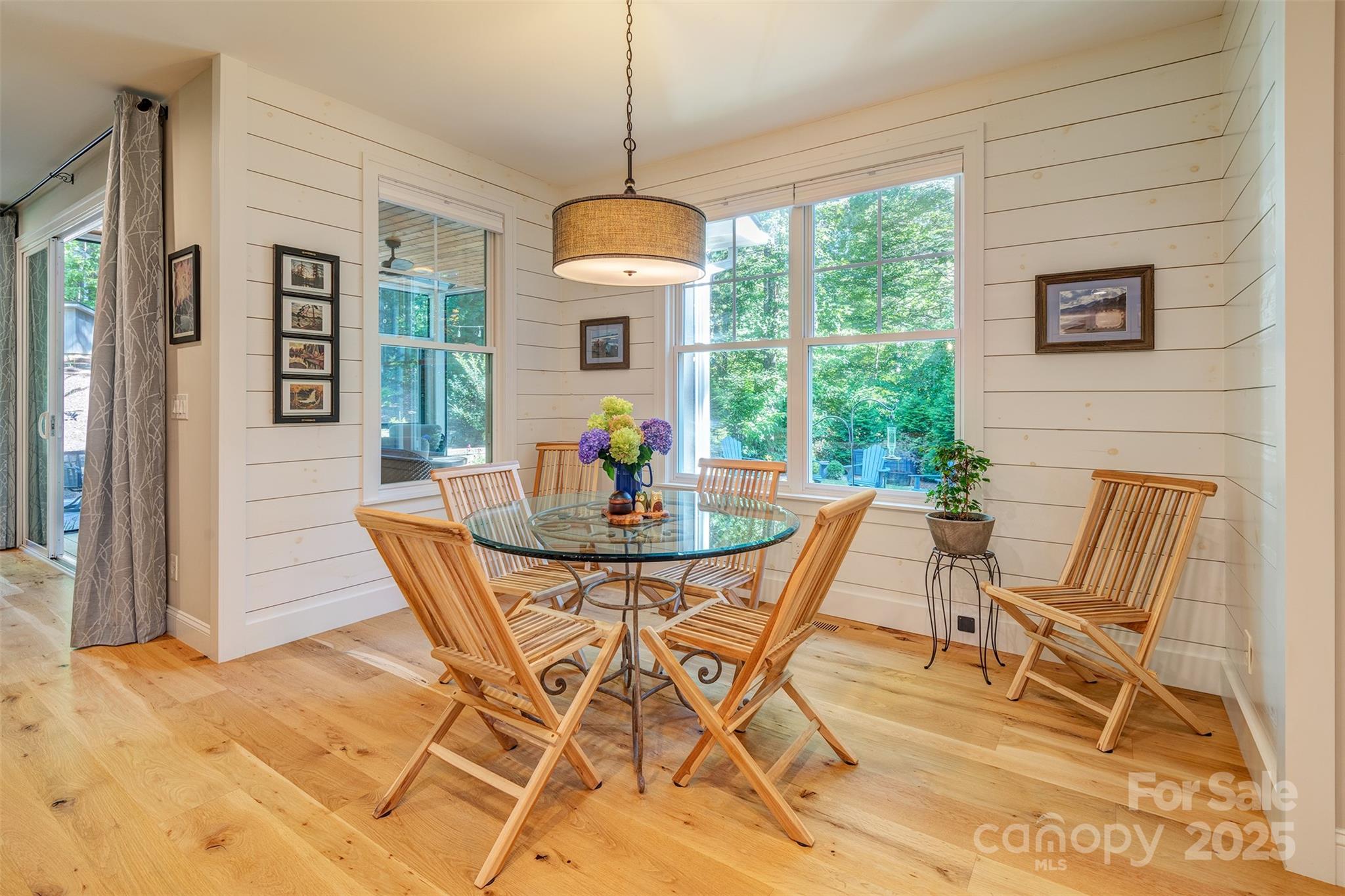 21 Ducketts Grove Road Fletcher, NC 28732 - Photo 16 of 42 a view of a dining room with furniture window and outside view