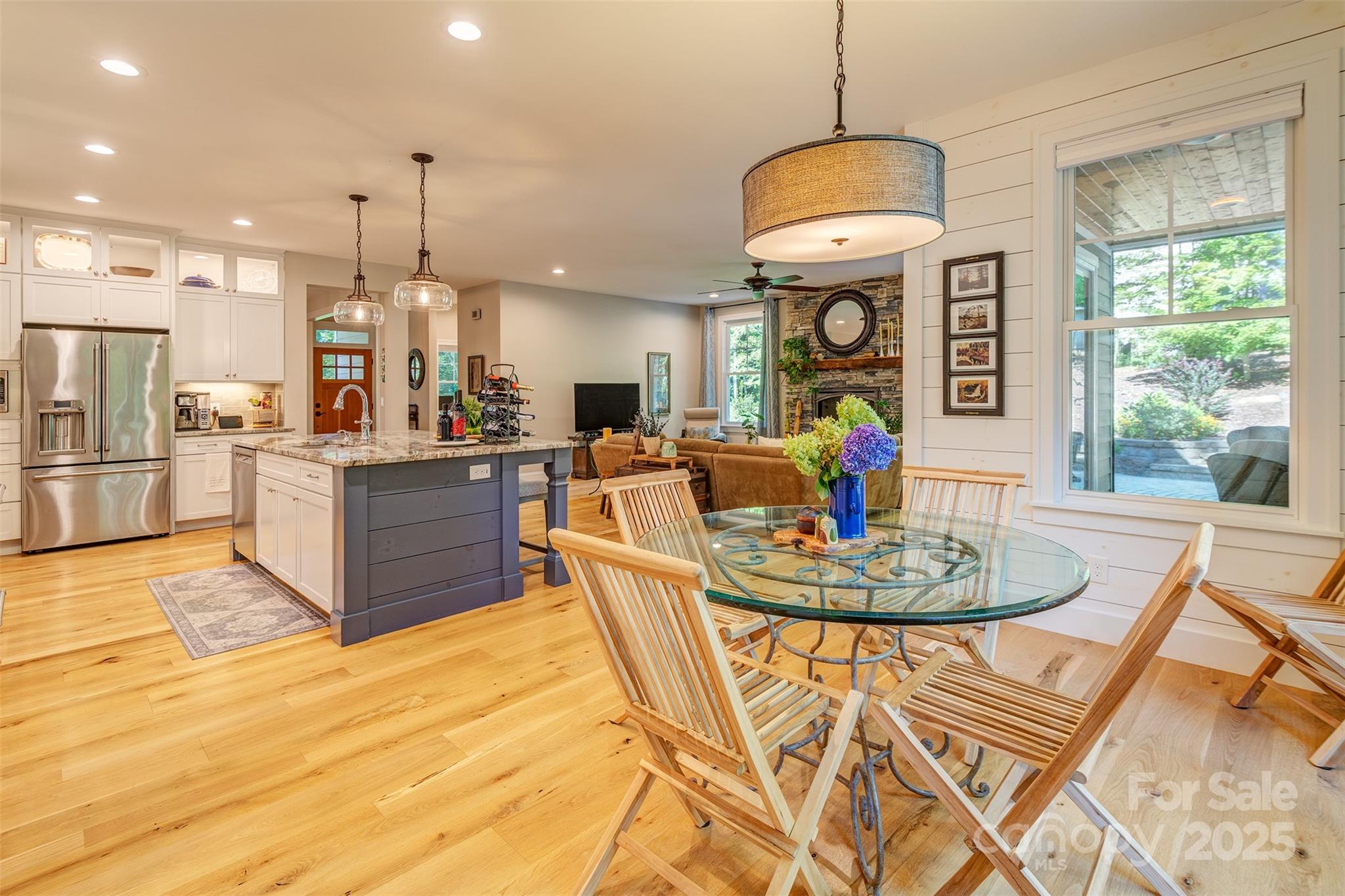 21 Ducketts Grove Road Fletcher, NC 28732 - Photo 17 of 42 a living room with stainless steel appliances granite countertop furniture and a chandelier