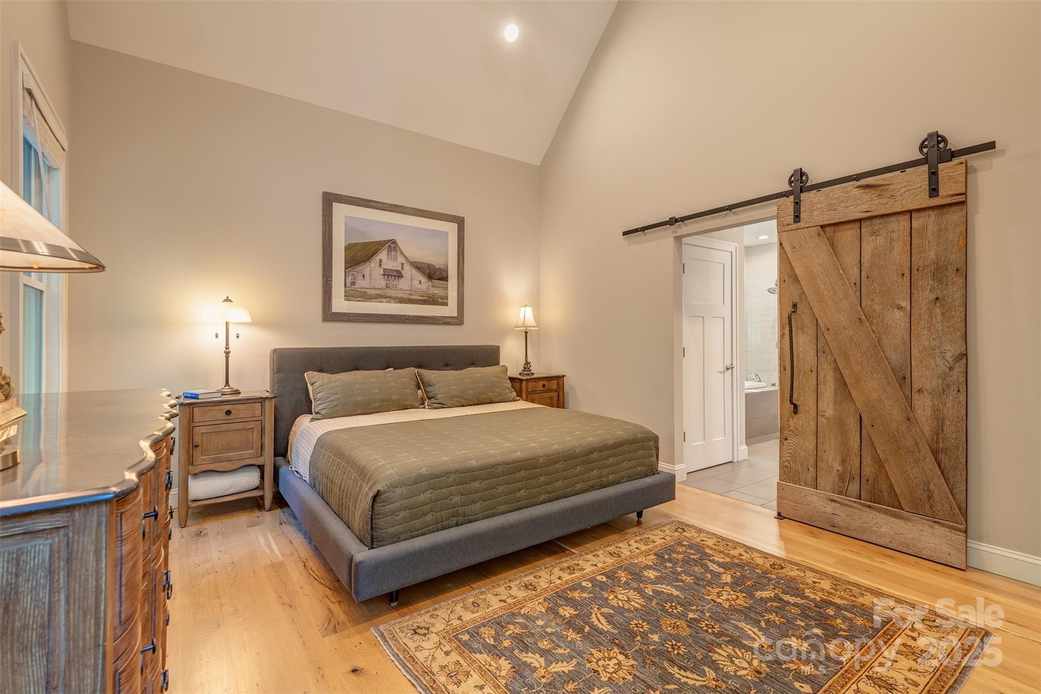 21 Ducketts Grove Road Fletcher, NC 28732 - Photo 21 of 42 a spacious bedroom with a bed and a rug