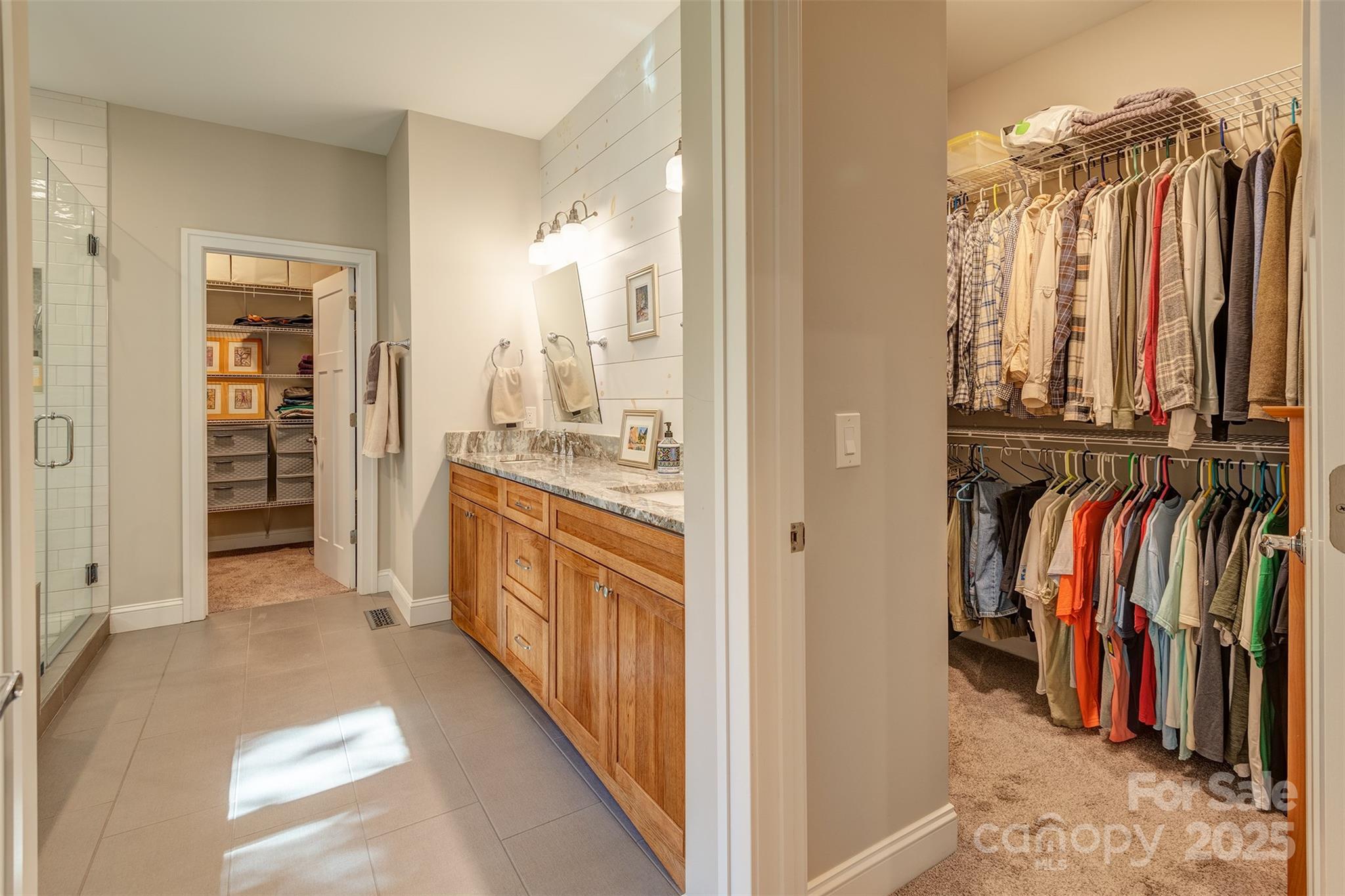 21 Ducketts Grove Road Fletcher, NC 28732 - Photo 22 of 42 a view of walk in closet with clothes and shoes