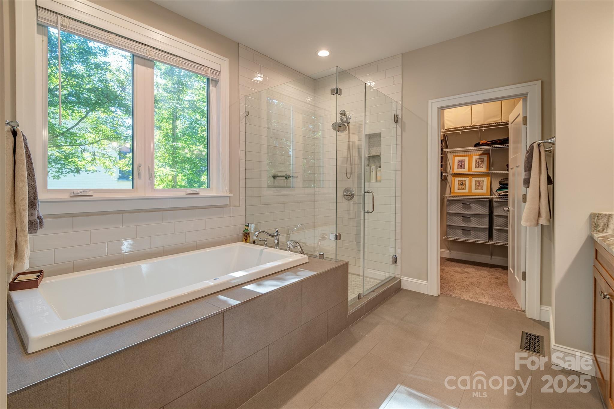21 Ducketts Grove Road Fletcher, NC 28732 - Photo 23 of 42 a spacious bathroom with a tub shower and a sink