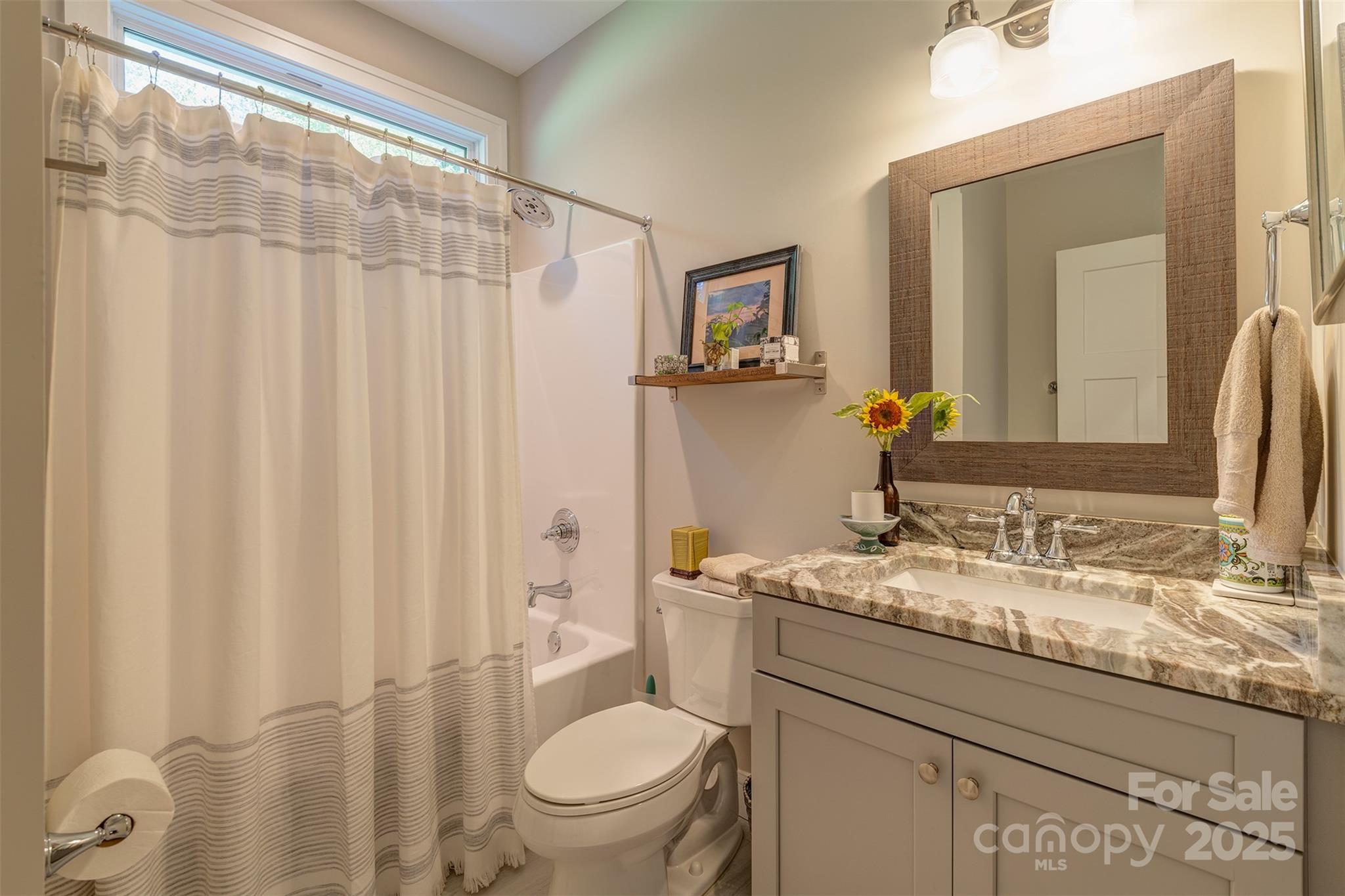 21 Ducketts Grove Road Fletcher, NC 28732 - Photo 26 of 42 a bathroom with a granite countertop sink toilet and shower