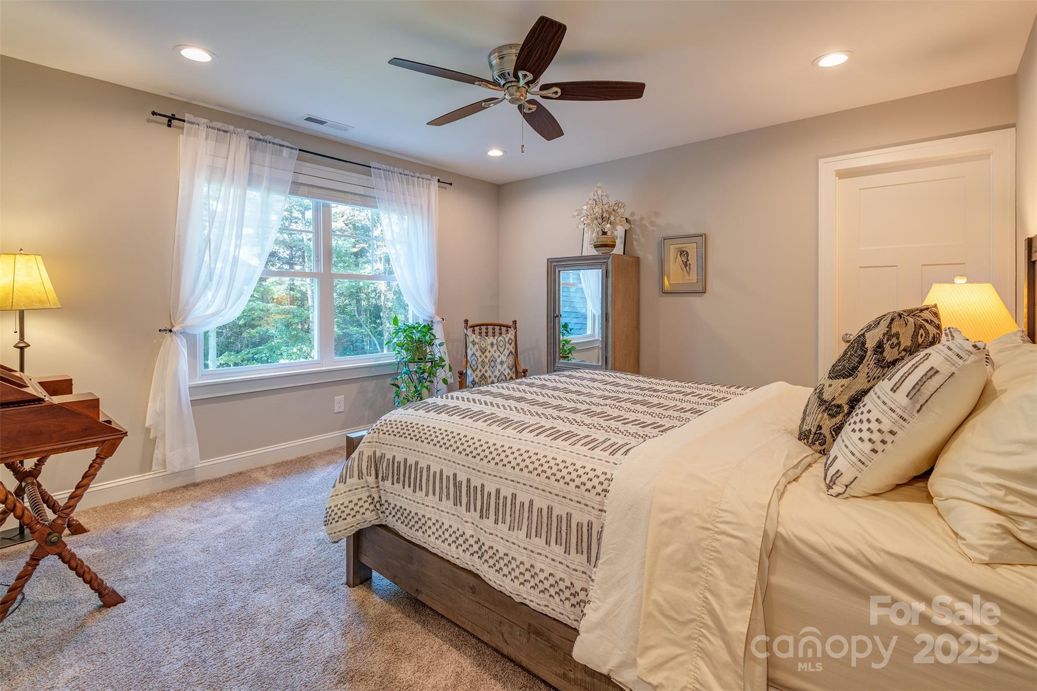 21 Ducketts Grove Road Fletcher, NC 28732 - Photo 27 of 42 a bedroom with a bed and a window