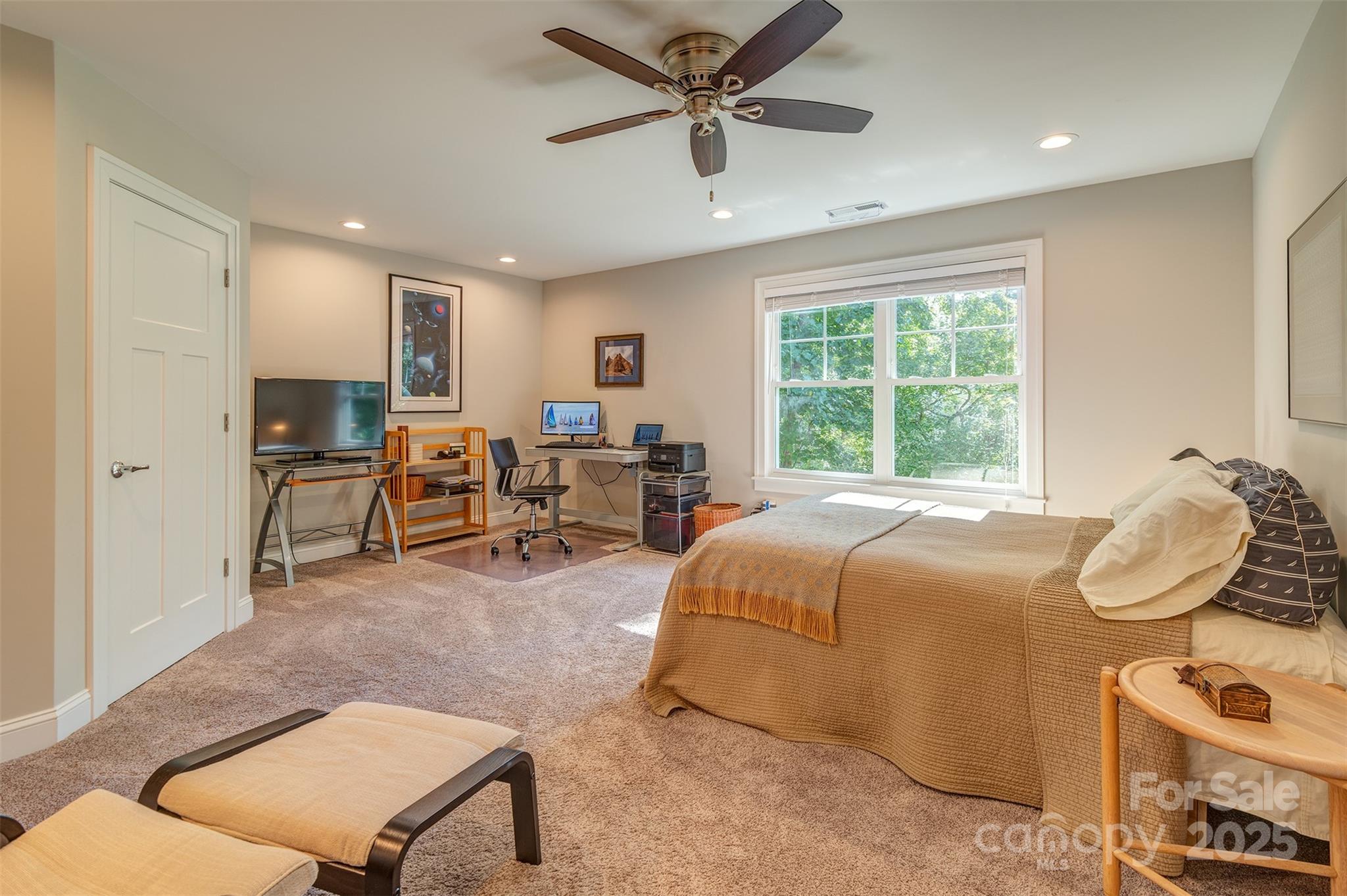 21 Ducketts Grove Road Fletcher, NC 28732 - Photo 28 of 42 a bed room with a bed and a chair