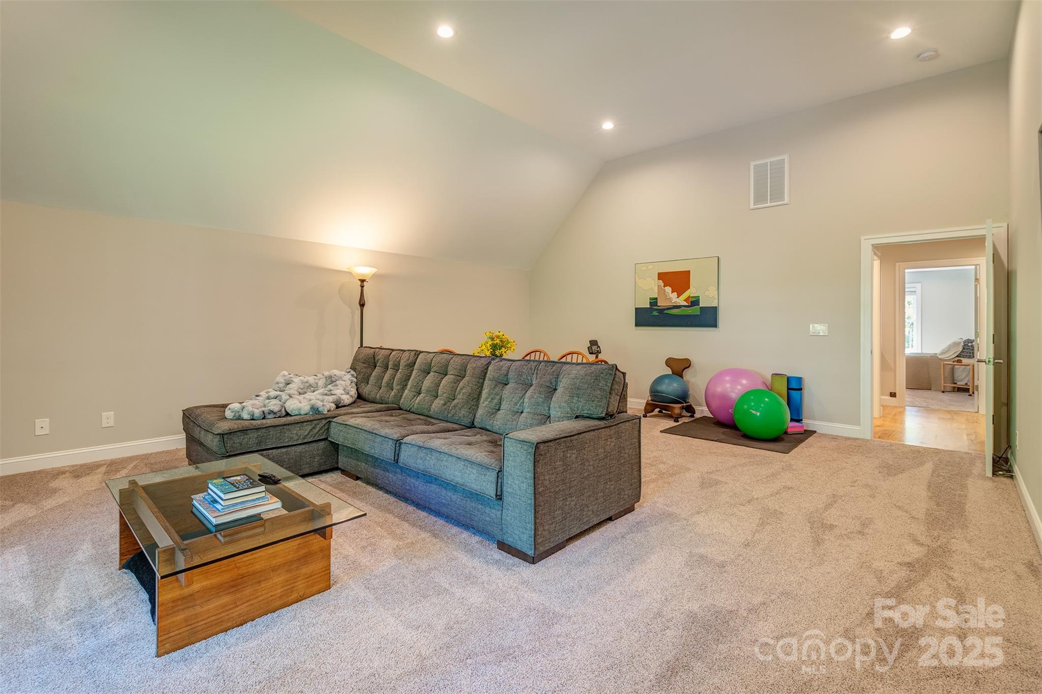 21 Ducketts Grove Road Fletcher, NC 28732 - Photo 32 of 42 a living room with furniture and a wooden floor